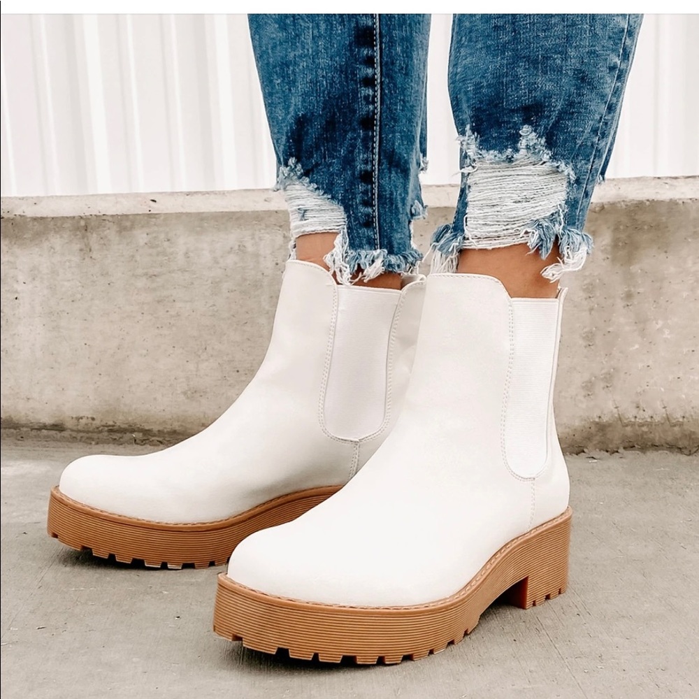 Brand new size 9.5 light white boots from Nanamacs boutique!